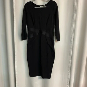 Leon Max limited edition black dress with leather criss cross at waist.  Size 12